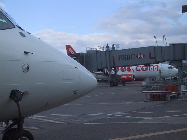 Avro nose HSBC gangway easyjet b737 in background
