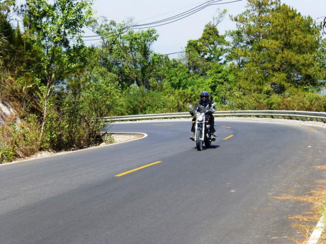 Motorcycle around corner of street