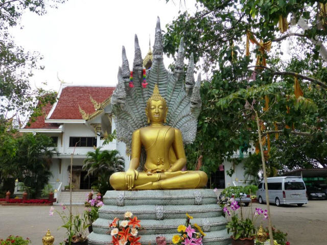Thailand Chiang Mai god statue with flowers