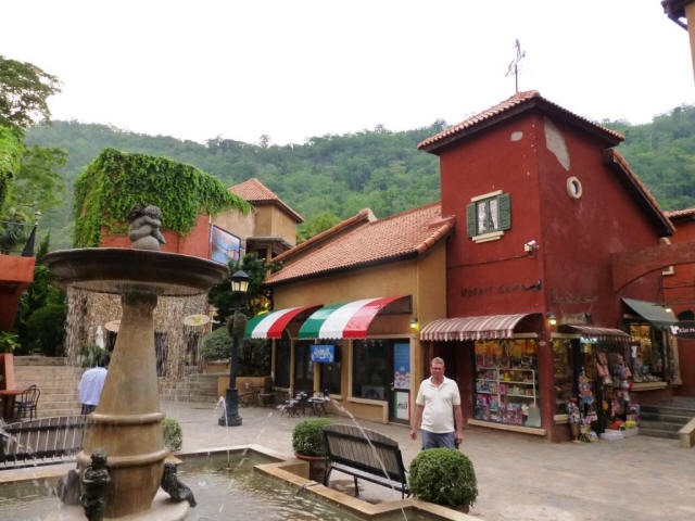 Stefan in the middle of market place of small village