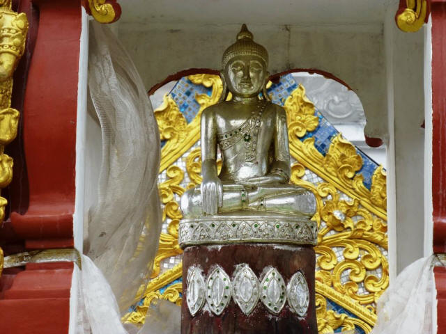 Thailand Chiang Mai god figure under roof