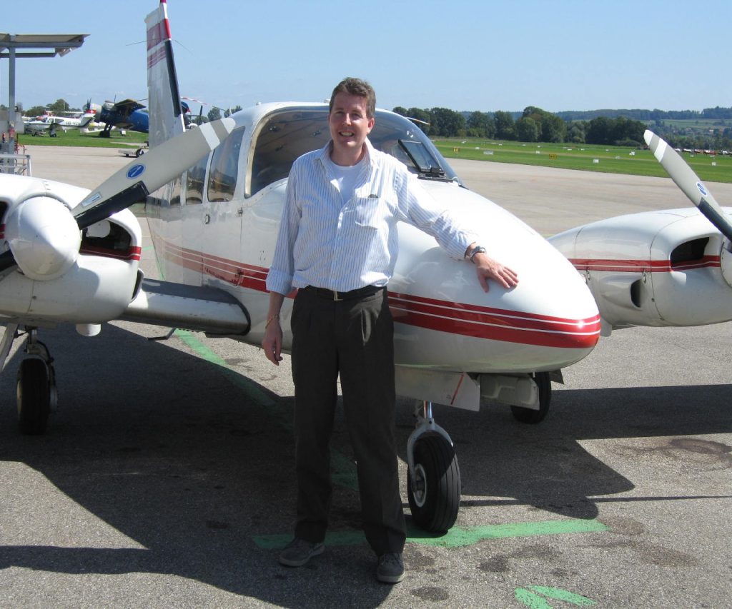 HB-LEM Beat in front of his plane