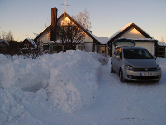 House Stocka winter VW car in driveway