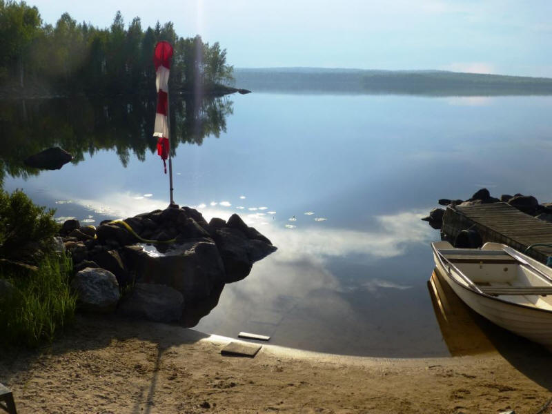 Beach with boat "silent waters"
