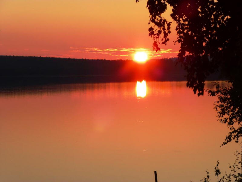 Sunset at stuga at lake
