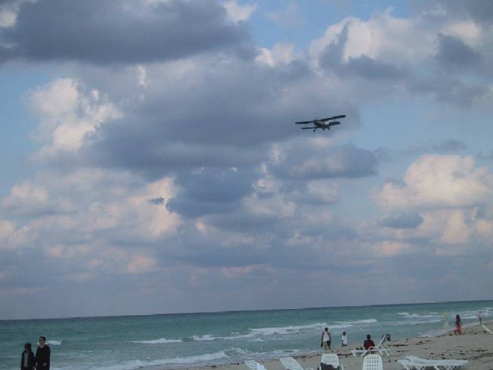 VRA Antonov 2 over beach Cuba