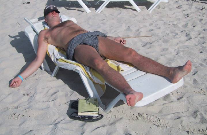 Varadero Cuba Stefan sleeping on beach tanning chair